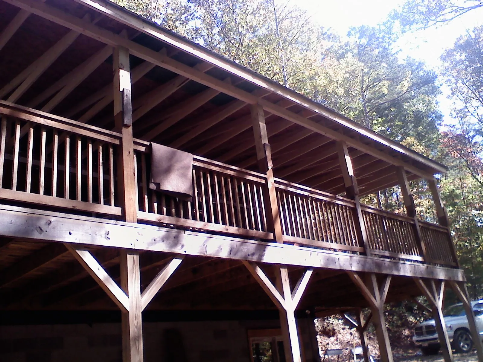 Timber framing under a new elevated porch and deck — Roof Leak Repair in Terra Alta by Roofing Brothers